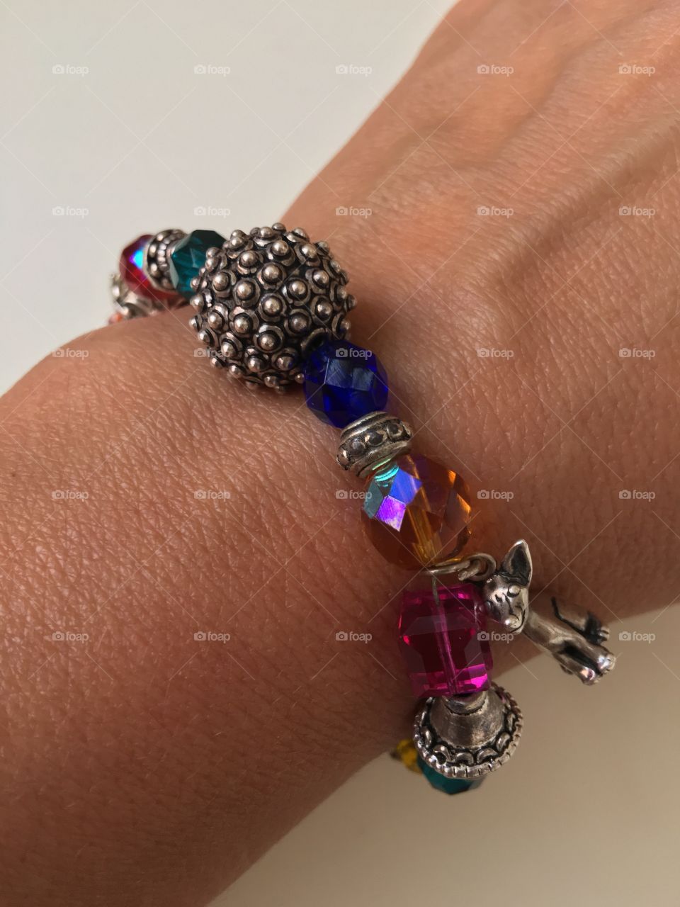 Brightly colored hand made bracelet.