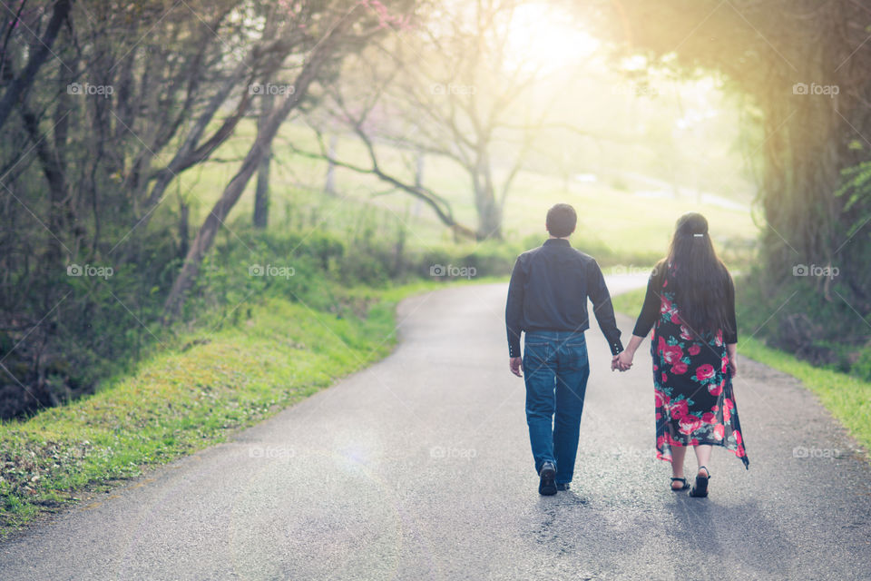 Couple Walking Down a Country Road