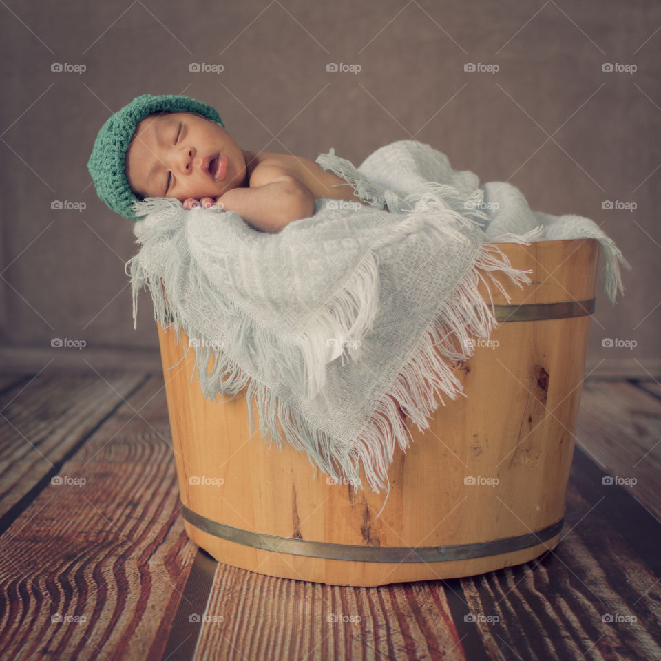 infant on a tub