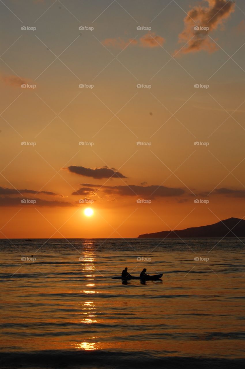 Rowing at sunset 