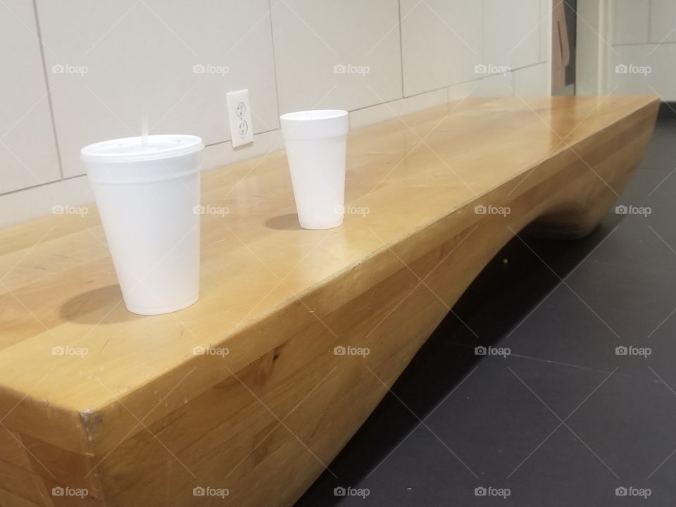 Cups on a Wooden bench