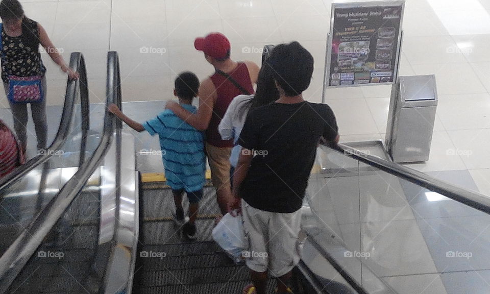 people in escalator