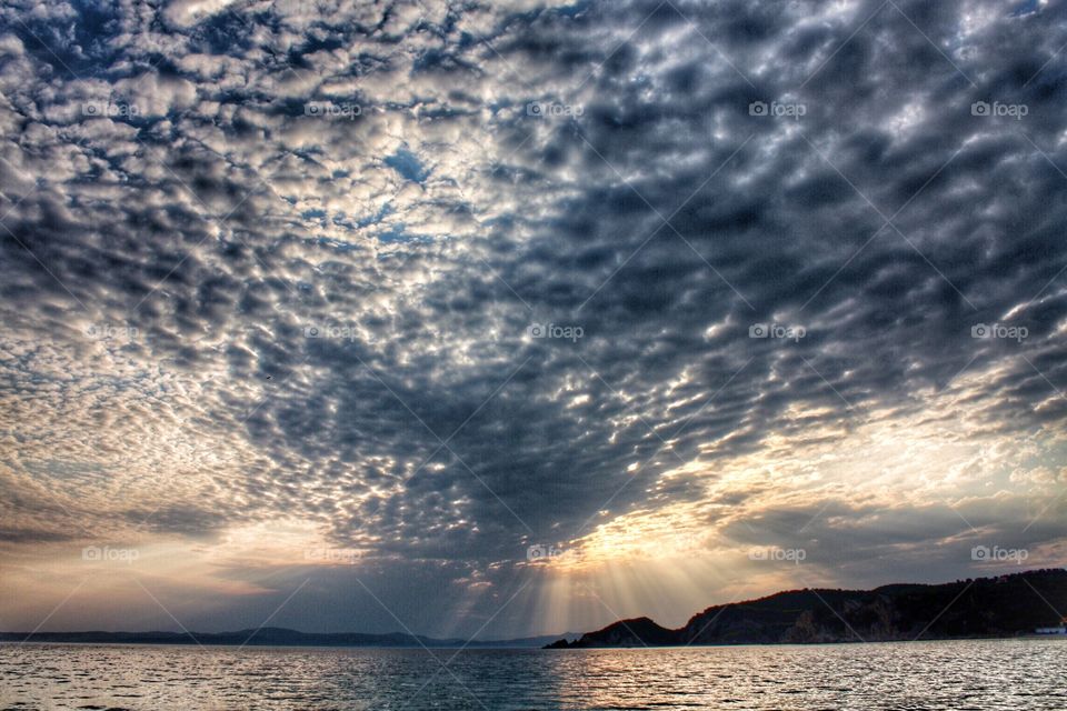 Illuminating sunrays at alykes beach