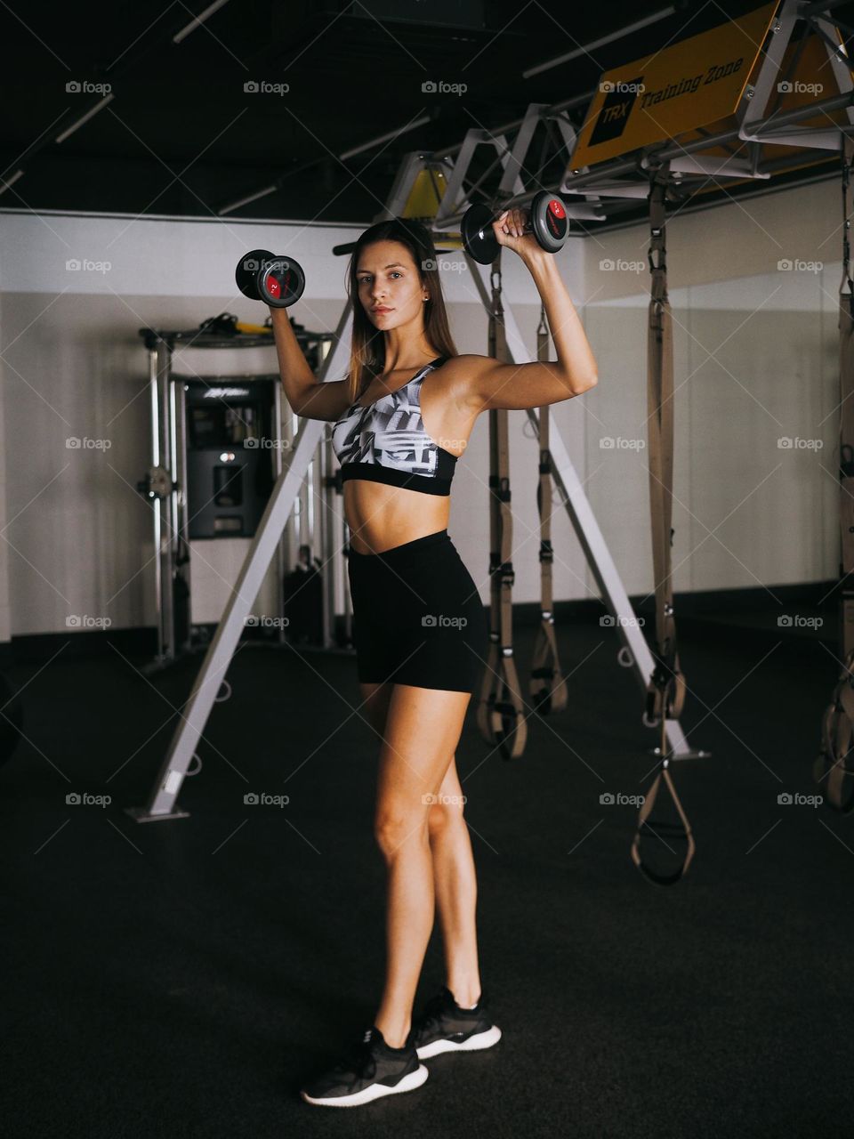 Young woman in gym 