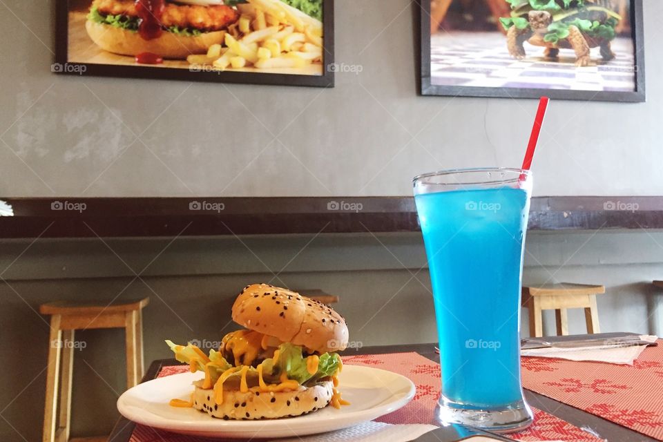 cheesy burger and blue lemonade