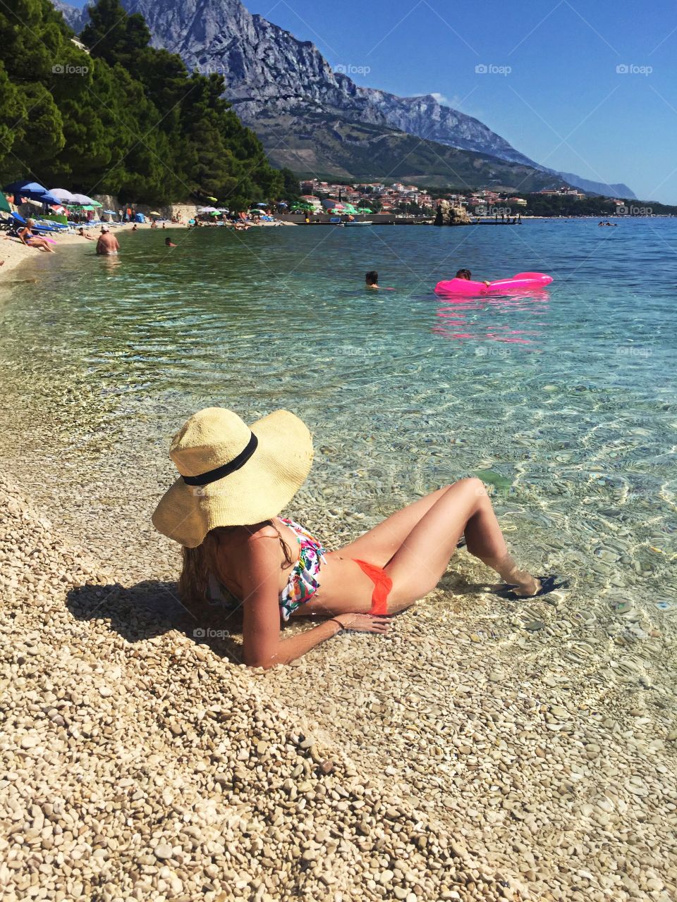 Woman resting at beach in Croatia