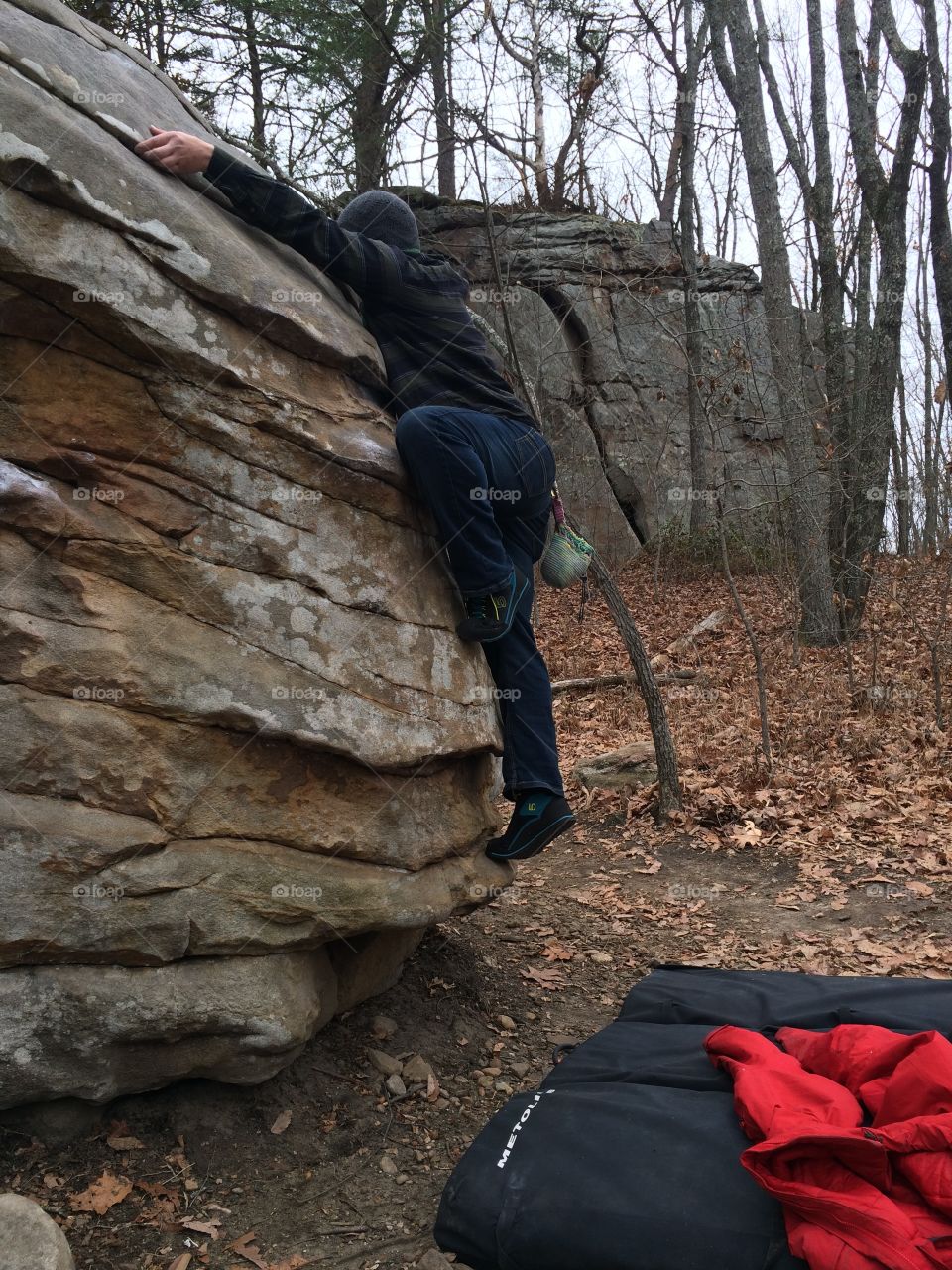 Climbing Spare on the Bowling Ball Boulder at Stonefort 