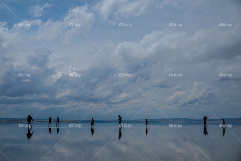 Water and sky and people