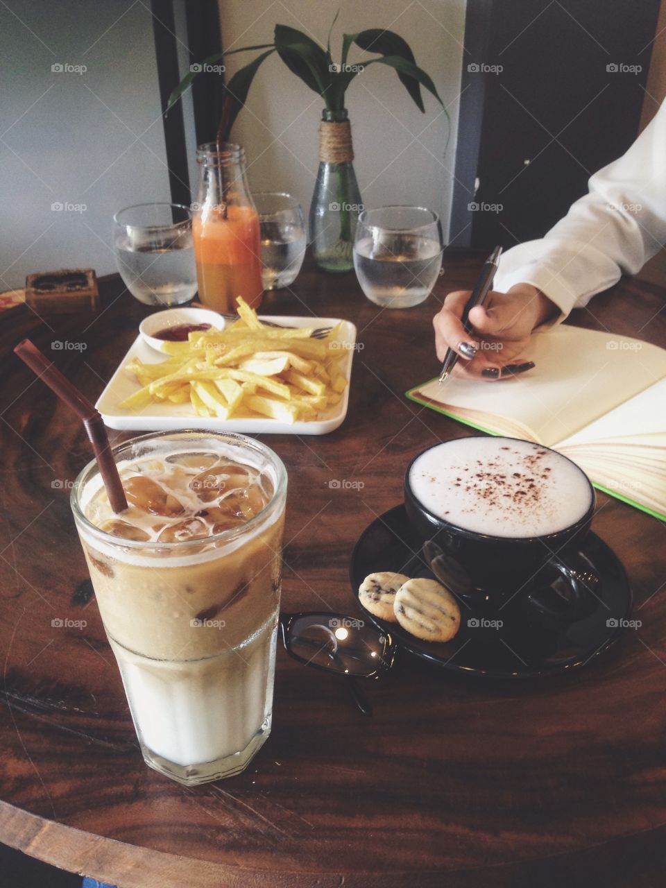 Person's hand with healthy breakfast