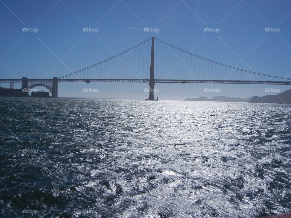 golden gate bridge and sun