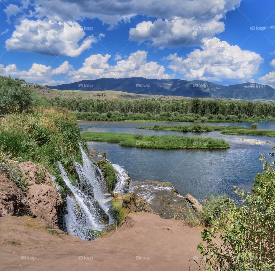 View of small waterfalls flowing into the Snake River.