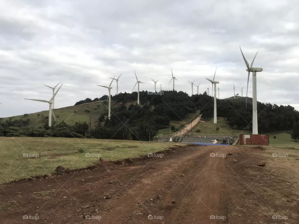 Wind Turbine Wind power turbine renewable energy environmental conservation power generation environment alternative energy wind farm Windmill sky landscape electricity technology in Ngong Kenya 