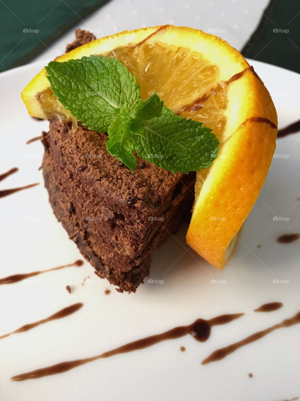 Chocolate cake with orange and mint 