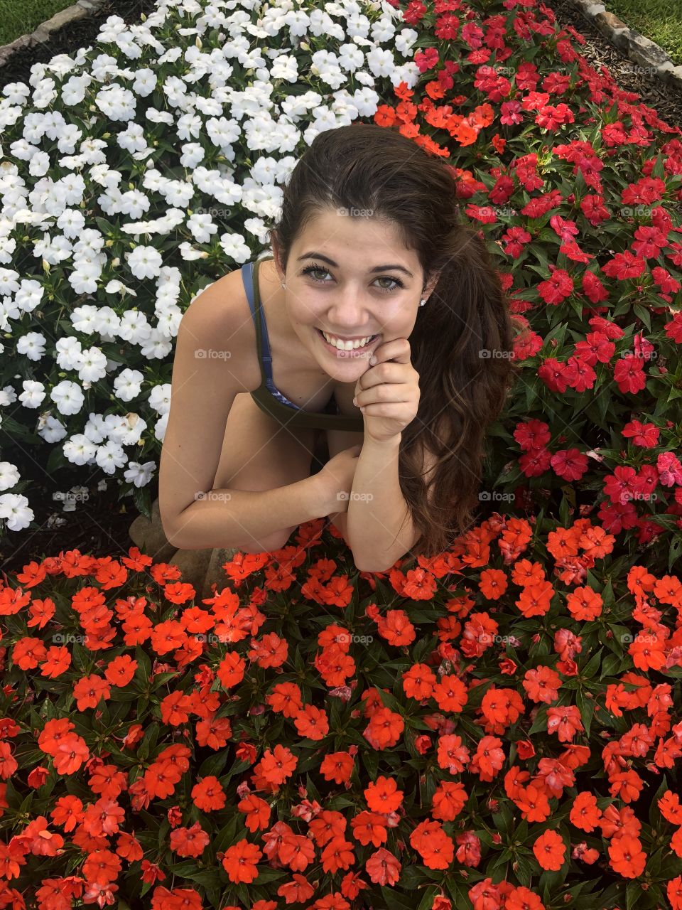 Me sitting on a rock in the middle of all these beautiful flowers ! LOVE  
