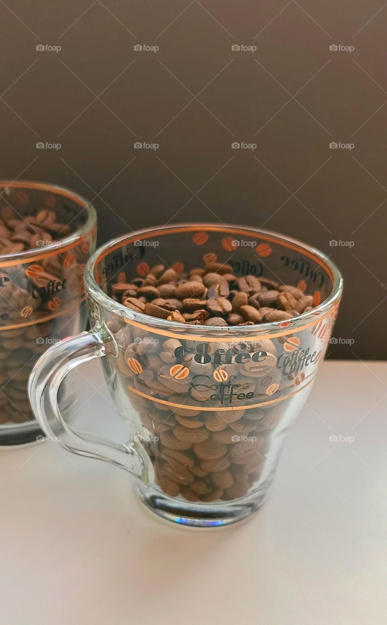 cups of coffee beans close up on a white background, love coffee, morning routine