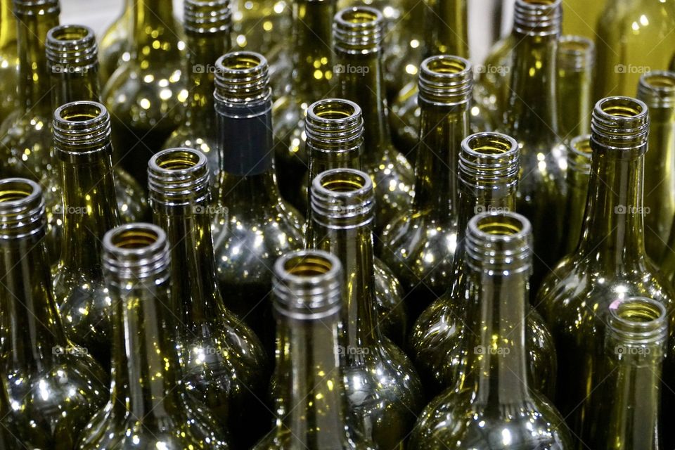 Green Empty wine bottles awaiting refilling