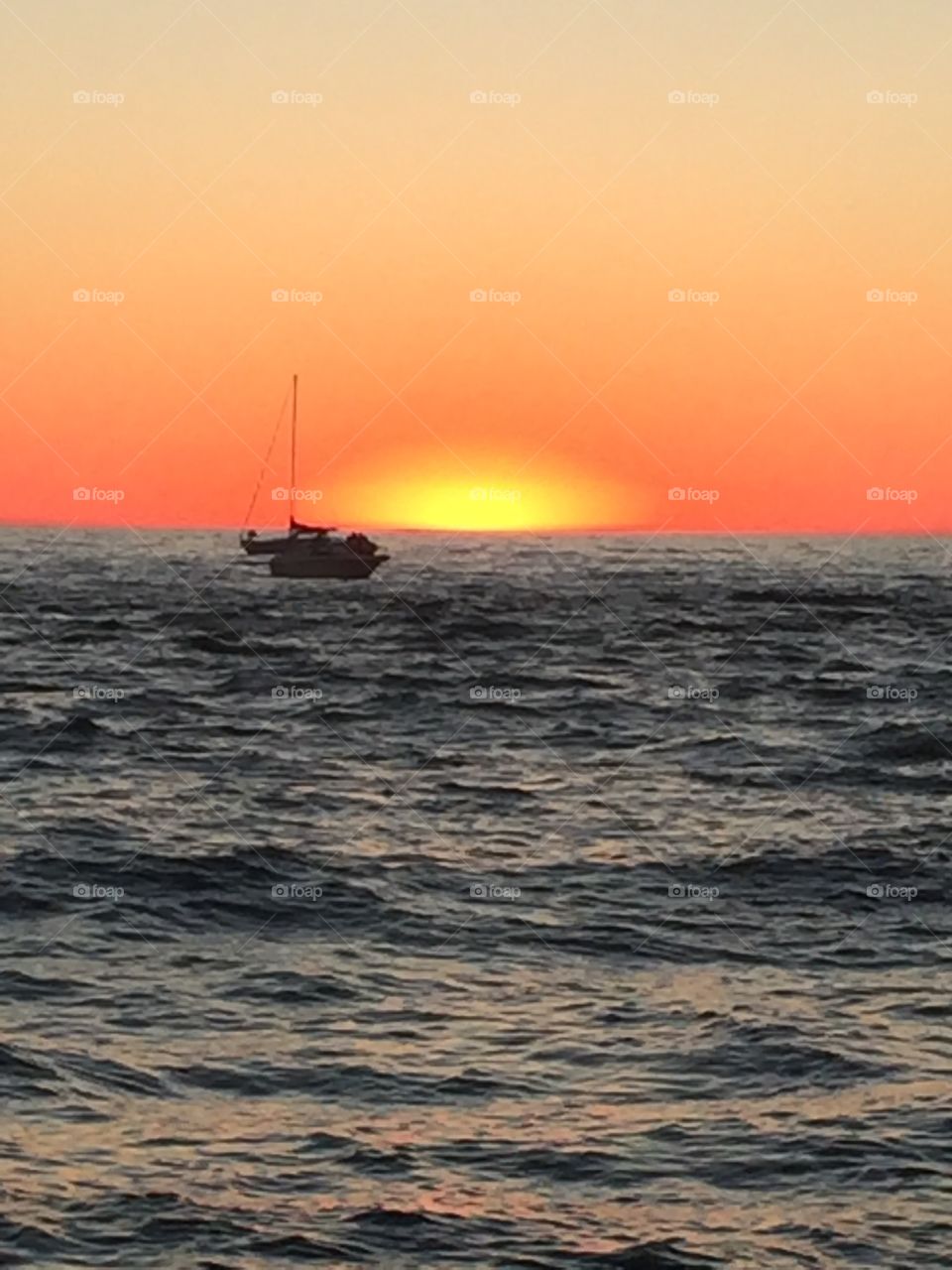 Sunset and sailboats 