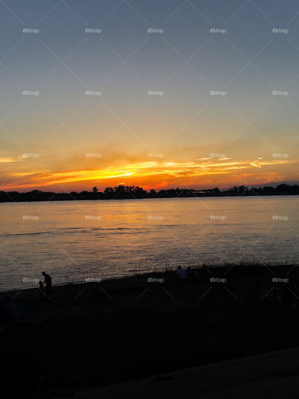 Beautiful view of the sunset on the Mississippi River in Baton Rouge Louisiana.