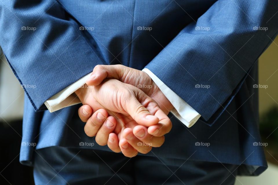 Man in suit waiting