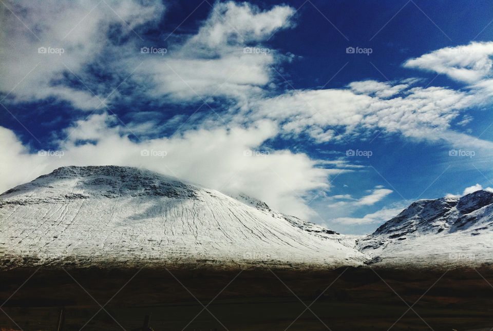 Snowy top and clouds 