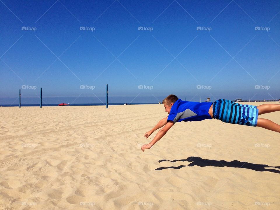 Reach The Beach. Boy excited to be a the beach