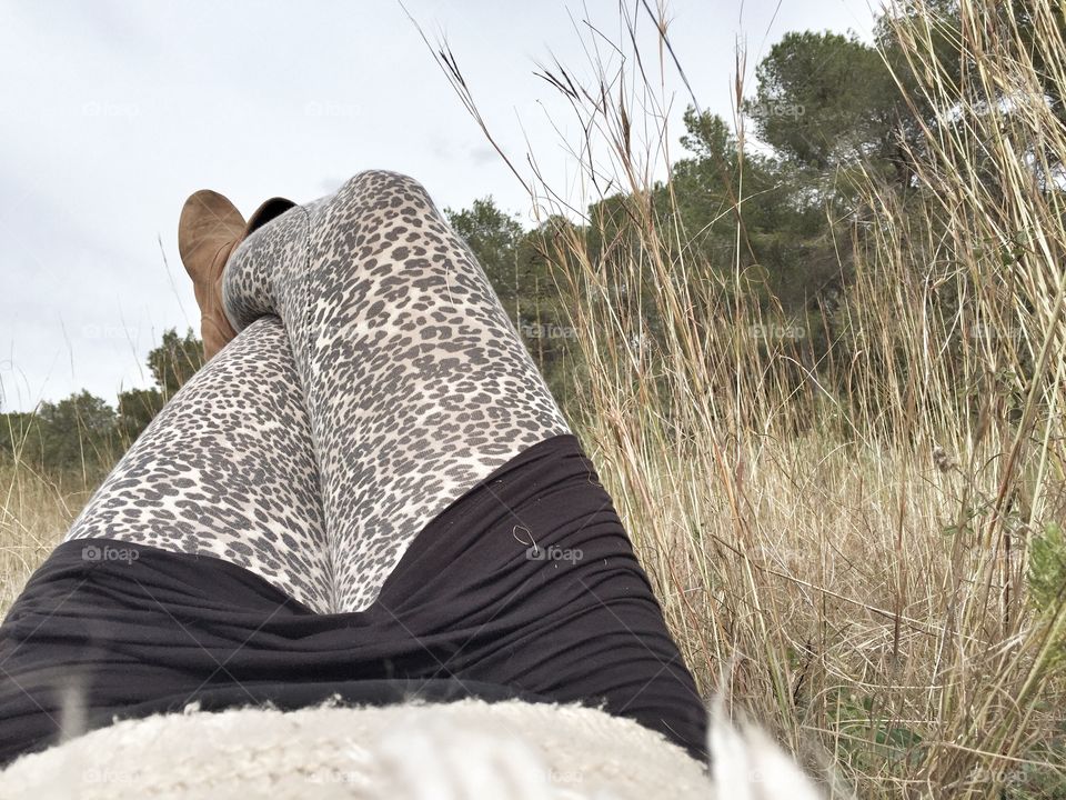 Woman chilling in a field