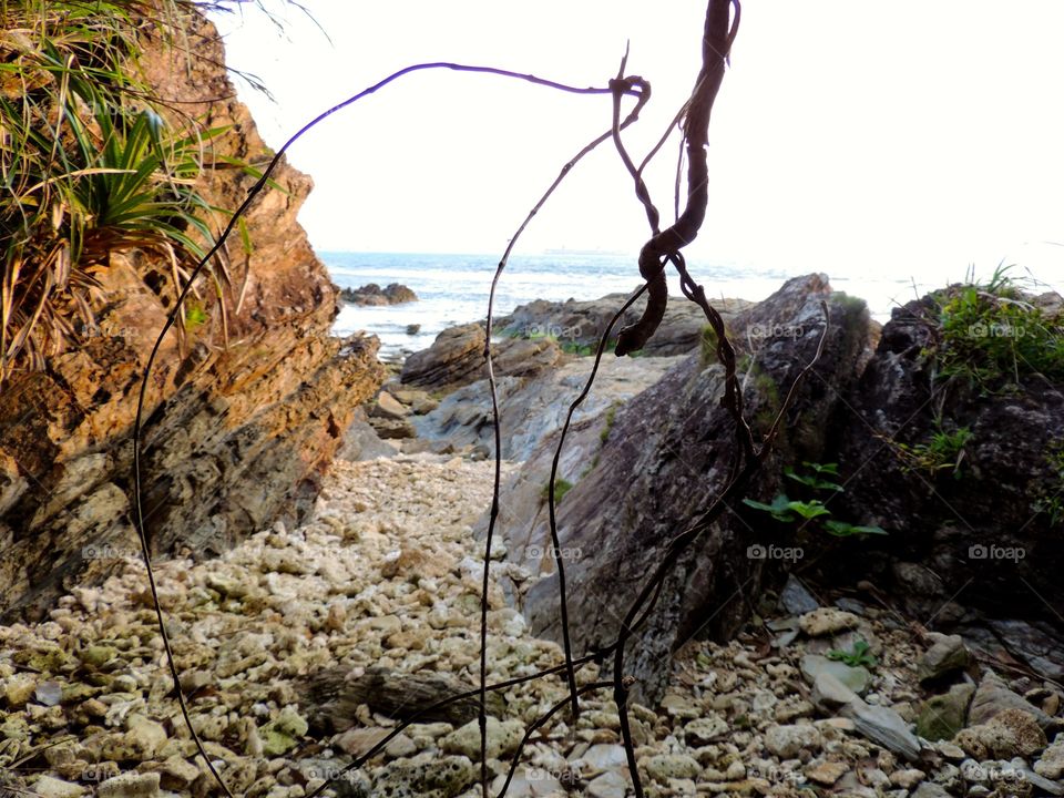 Beach perspective from a cave. Japanese beach from a cave 