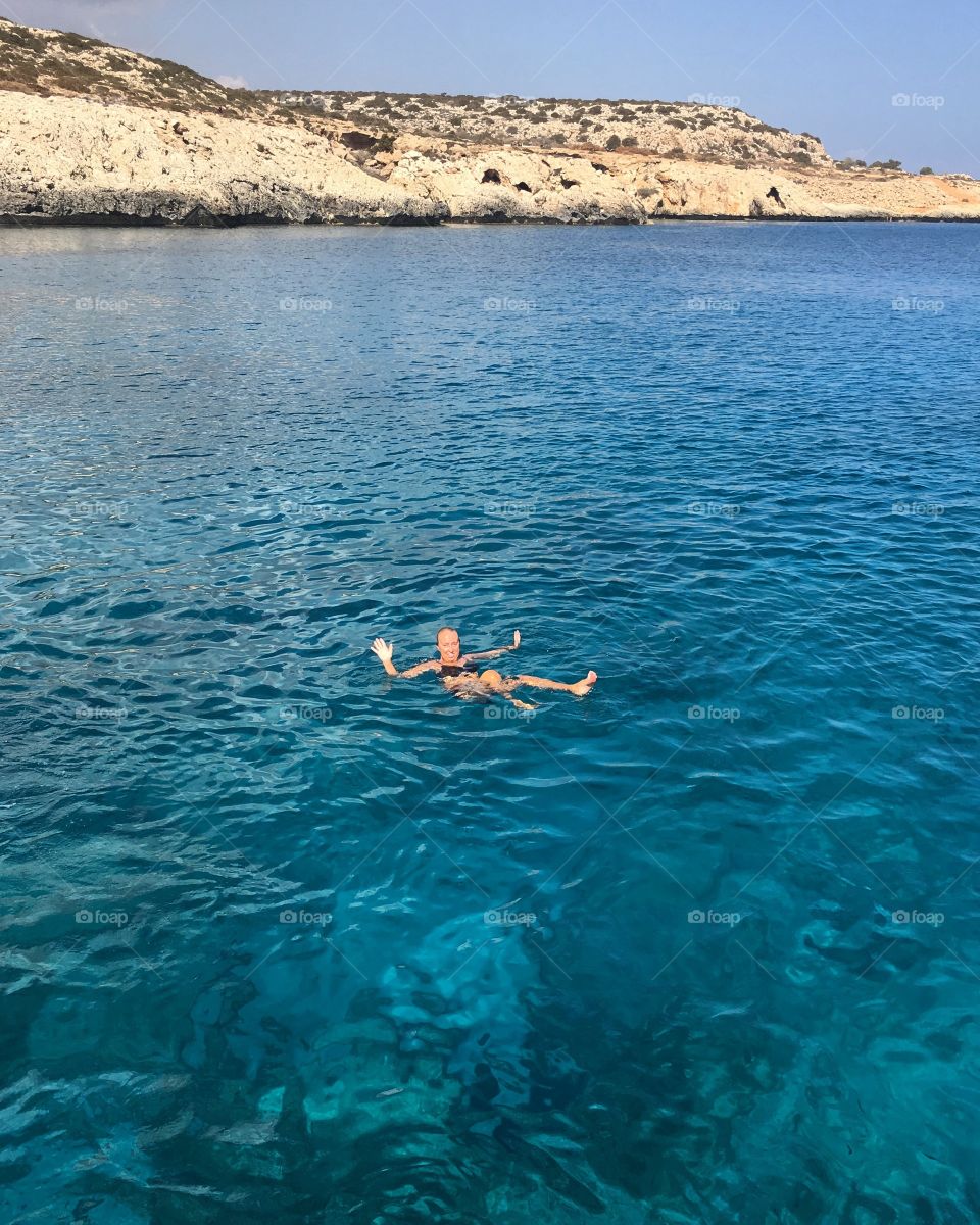 Woman enjoying in lake