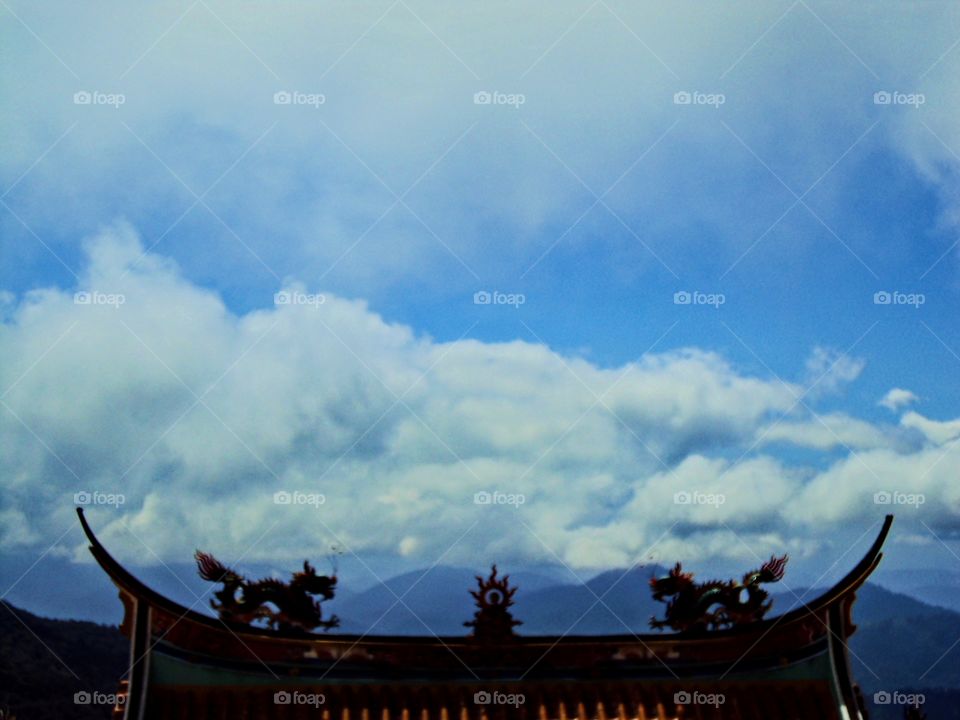 The decorations on the roof of the temple.