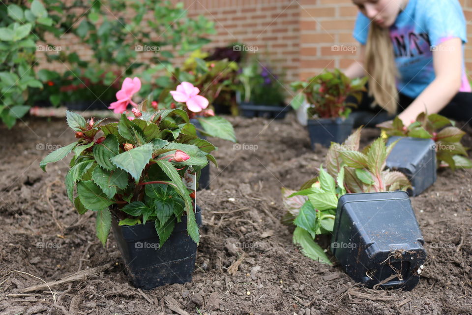 This is are community annual event. Plant Reynoldsburg is a group of volunteers that get together and plant flowers around the municipal buildings and parks to help beautify the community. 