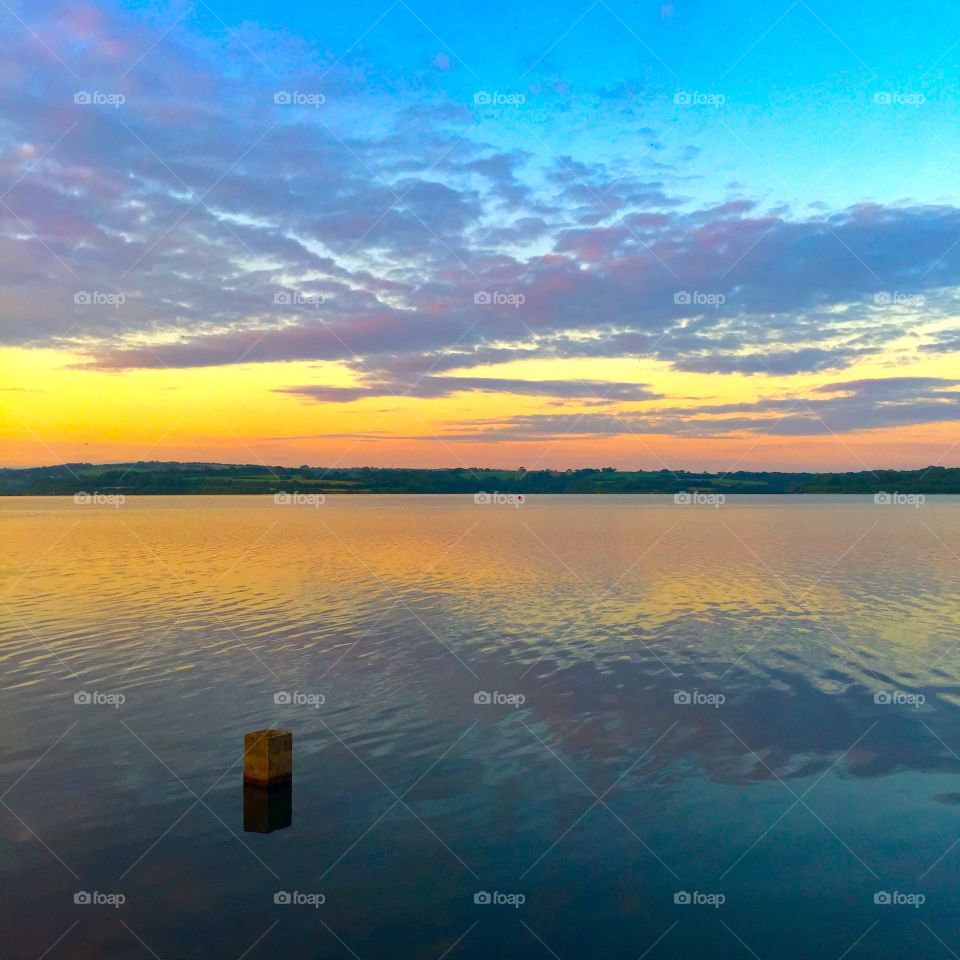 Dramatic sky reflecting in lake