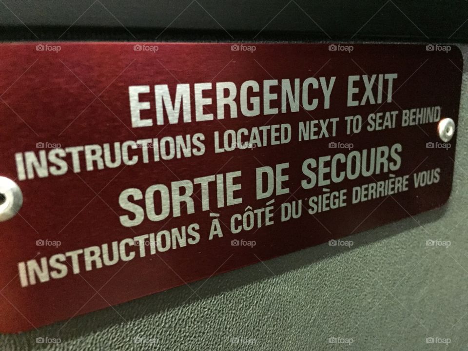 Emergency exit: in English and French