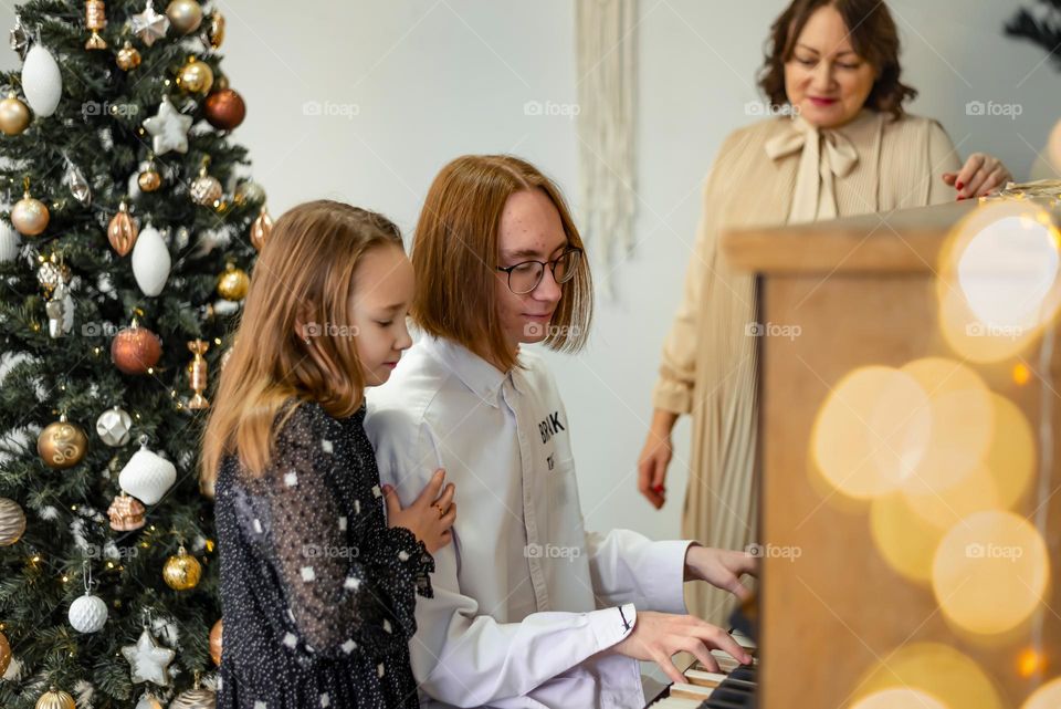 young man playing the piano