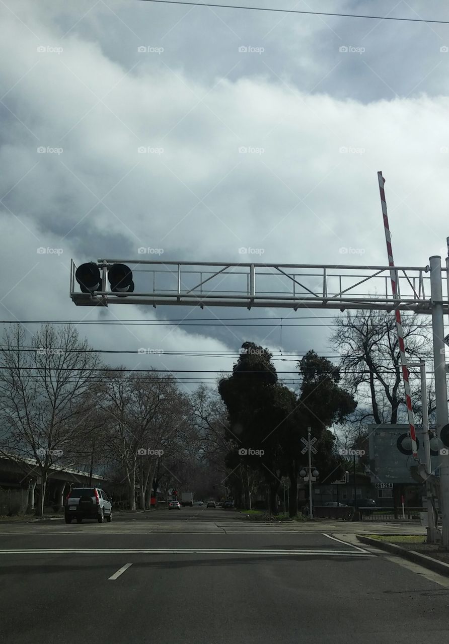 storm clouds railroad crossing