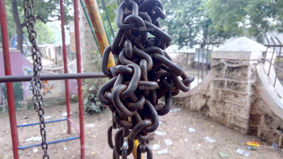 multiple metal chains hanging