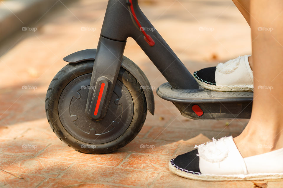 Scooter wheel and foots