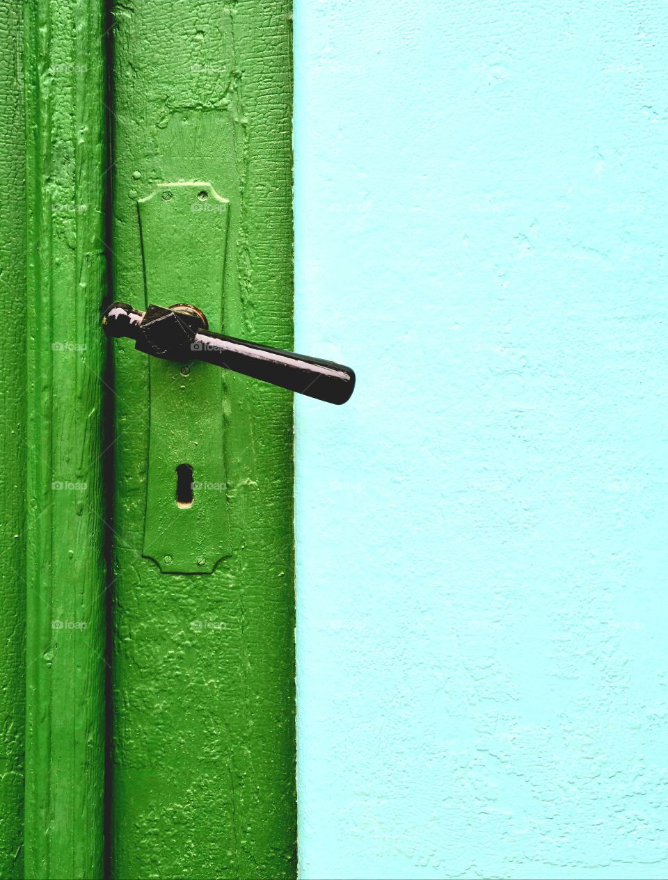old interesting black painted door handle
