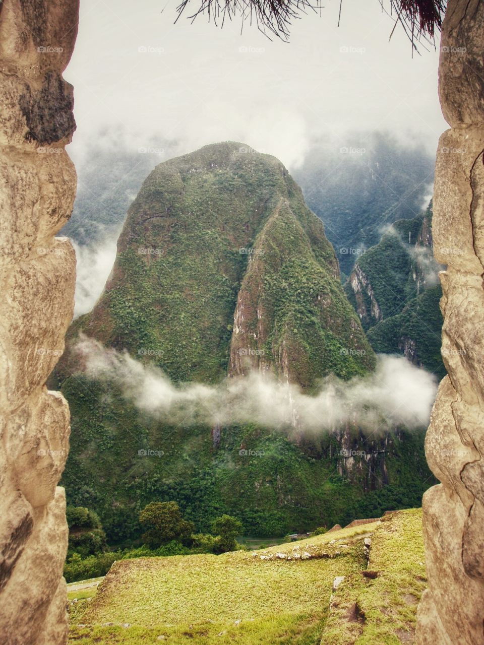 Clouds surrounding a mountain at Machu Picchu