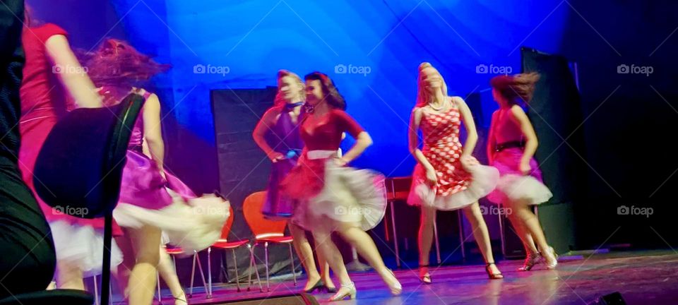Petticoats are twirling up high as the girls spin around on the dance floor during this showcase of “West Side Story” at the music academy of “Regensburg”, Germany. 2024. Hypnotic Productions