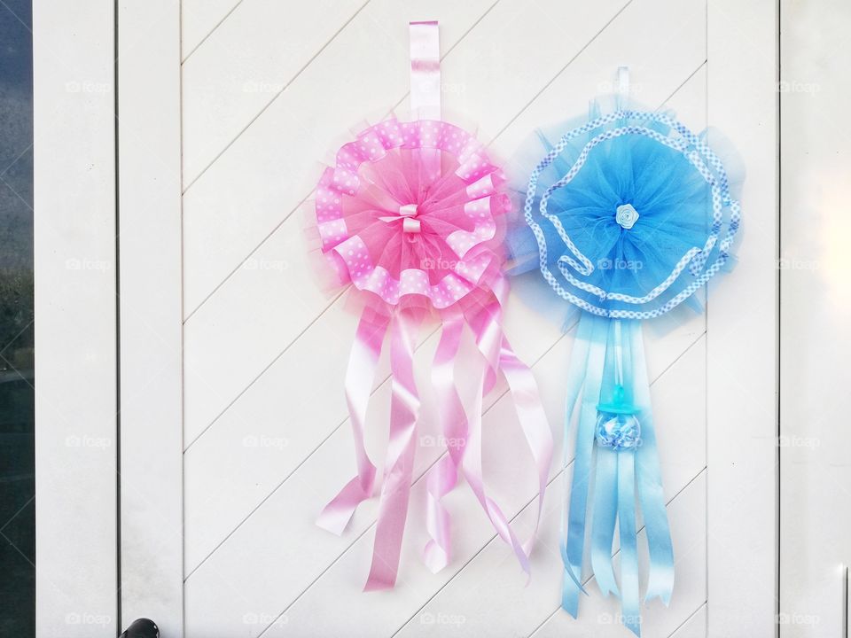 Pink and blue birth flakes