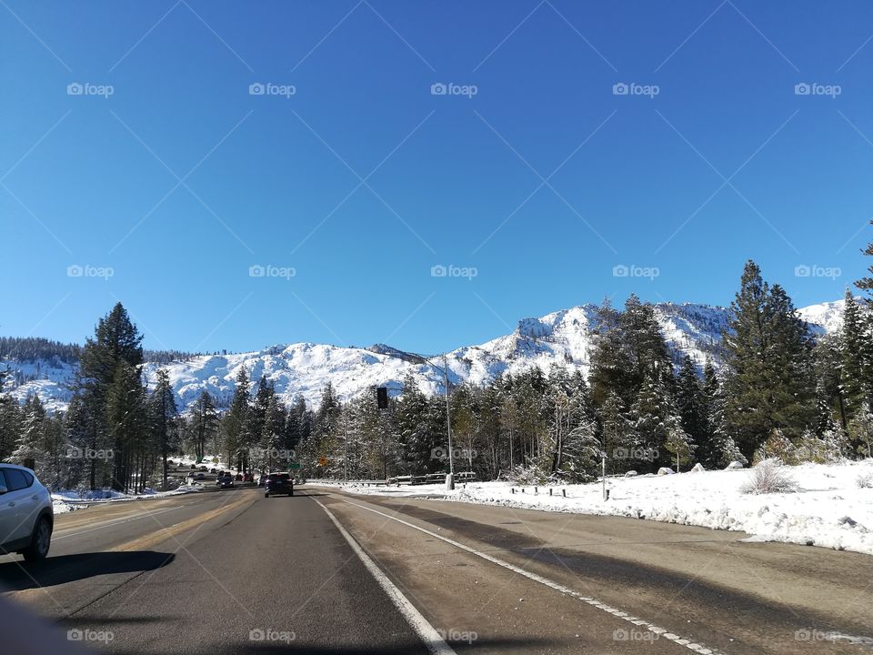 white snowy mountains with blue sky