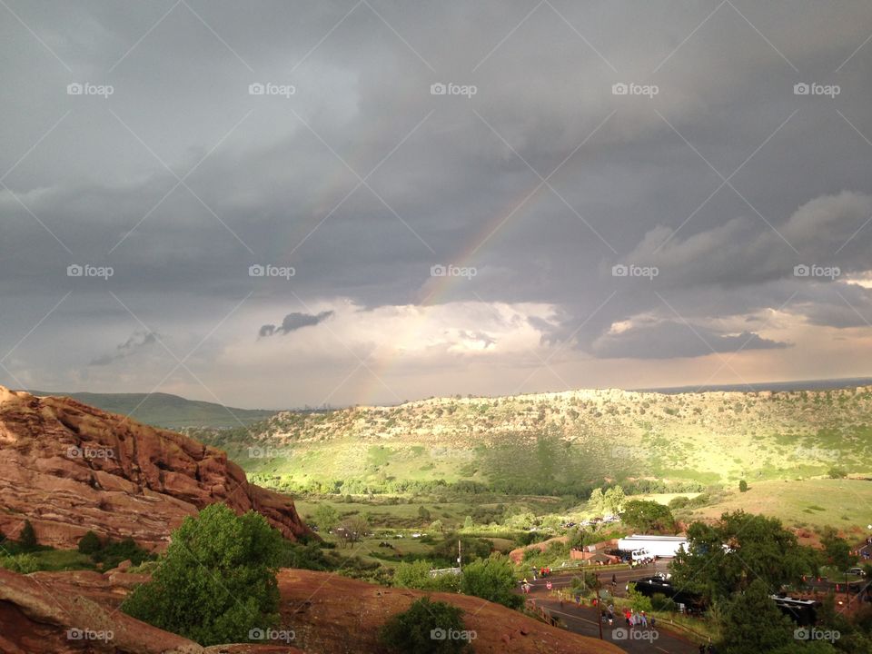 Scenic view of canyon with double rainbow