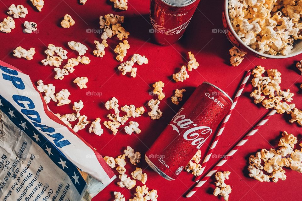 Flat lay with coca cola and popcorn