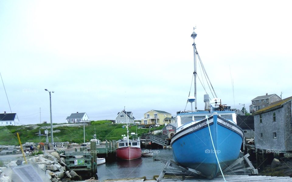 Nova Scotia Boat Yard. A Nova Scotia Boat Yard showing old wooden skiff