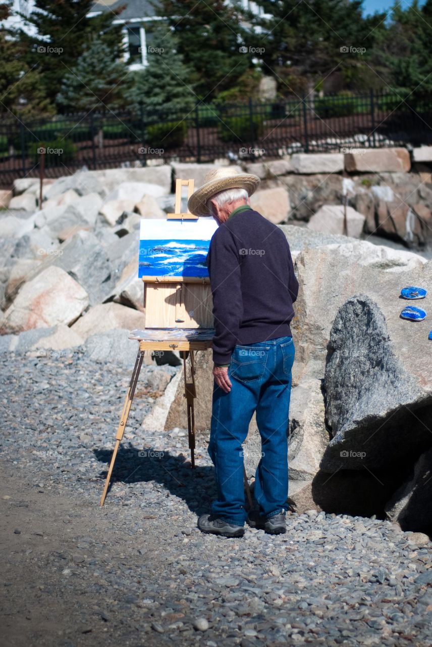 Artist Painting on Canvas at the Shore of Kennebunkport Maine