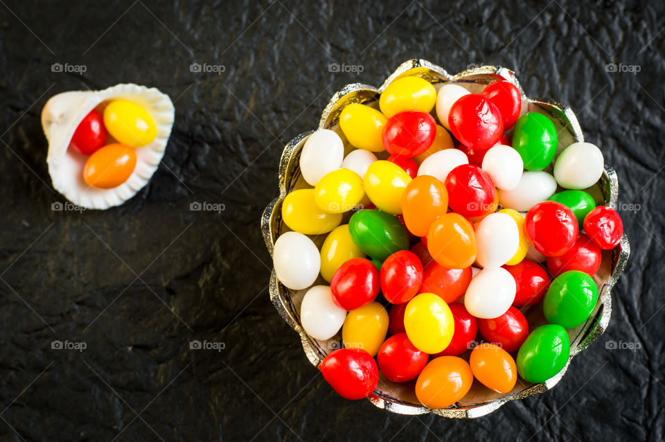 A bowl full of sugar candies.