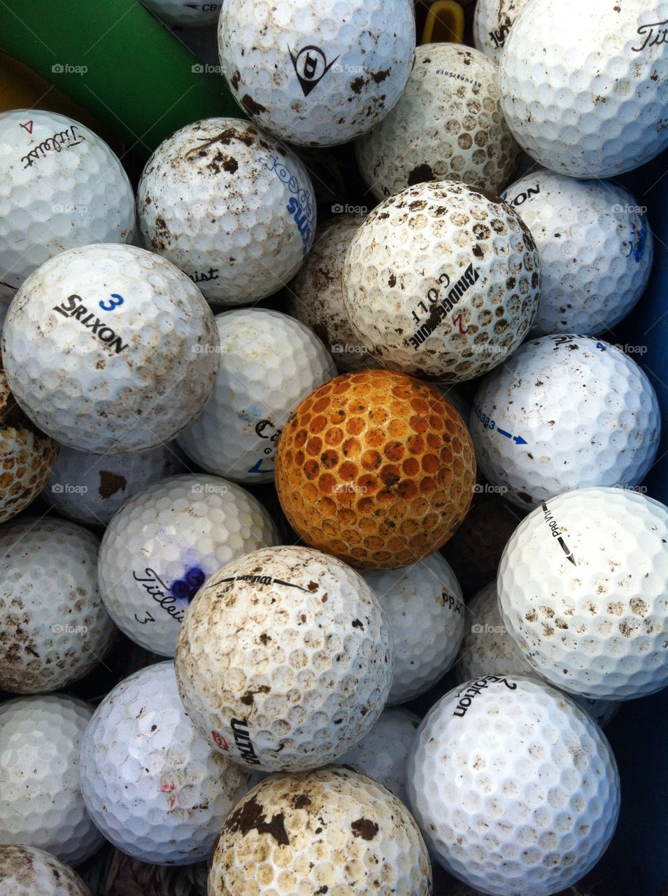  golf ball close up by zeewolf. A day finding lost golf balls
