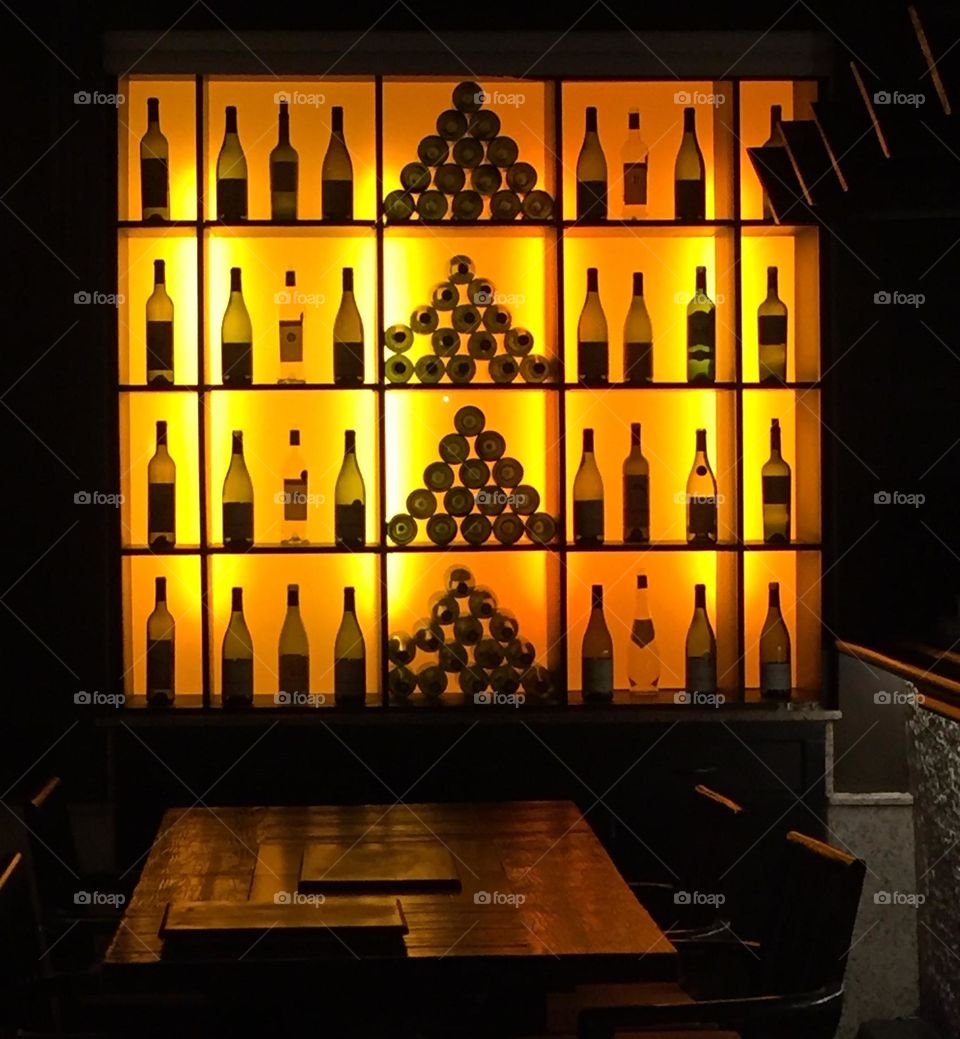 Wine area in restaurant, using wine to decorate, decorating using wine bottles, bar in restaurant, fancy restaurants 