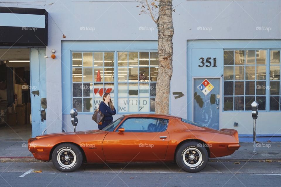 A classic muscle car: the Pontiac Firebird Formula 400 in copper/orange.