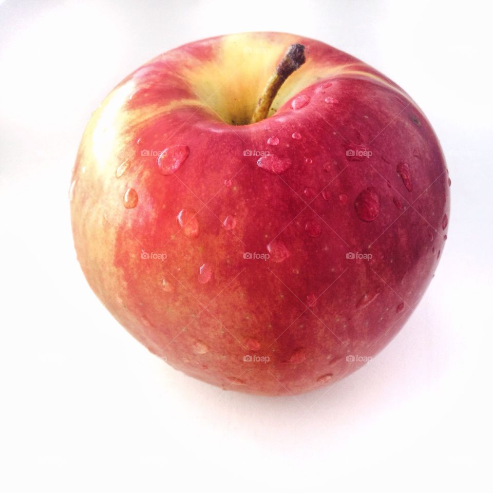 Red apple on white background